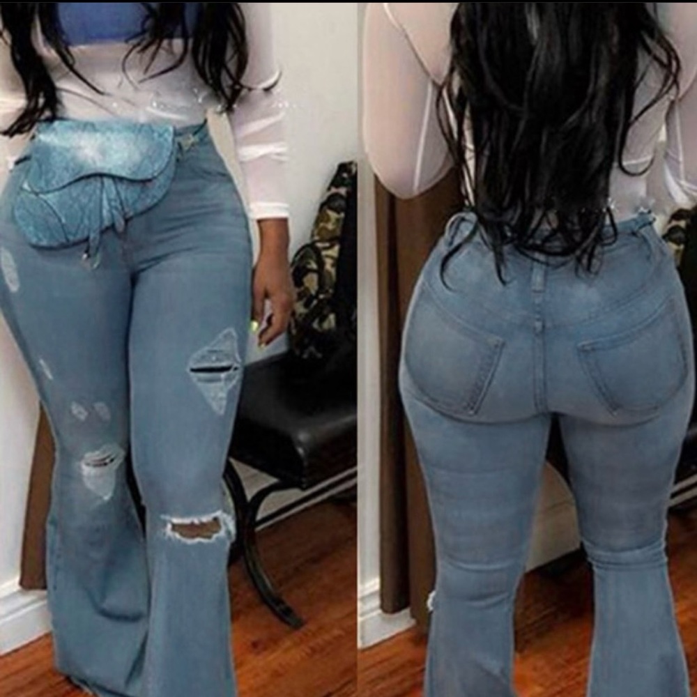 Distressed flared legged jeans